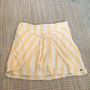 yellow and white strapless top